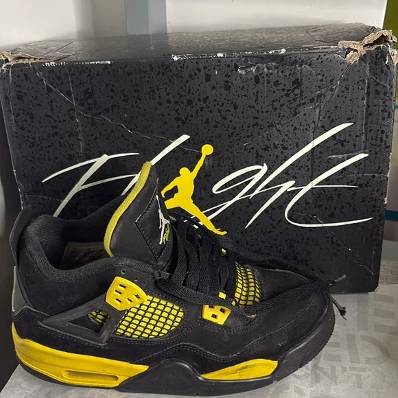 Black and YellowJordan 4’sSize 4.5 Boys USBox included upon request